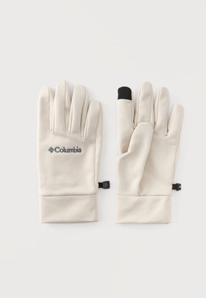 Paire de gants Columbia beige clair, l'un montrant l'avant avec le logo, l'autre l'arrière avec une pointe noire sur l'index, tous deux avec des clips au poignet.