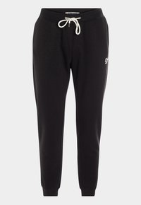 Zwarte sweatpants met een trekkoordsluiting en witte accenten, met een logo op het linkerbeen en ribbelboorden bij de enkels.