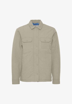 Beige skjortejakke laget av teksturert stoff, med spiss krage, to frontlommer og trykknapper; innsiden er foret i blått.