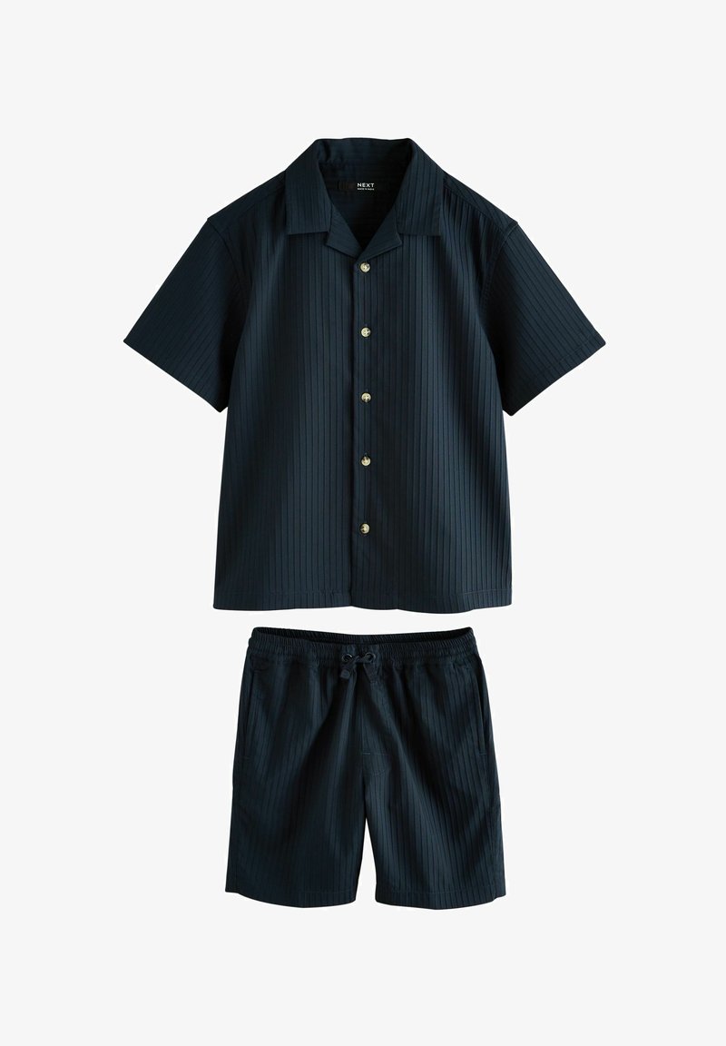 Black short-sleeve button-up shirt with vertical stripes paired with matching drawstring shorts.