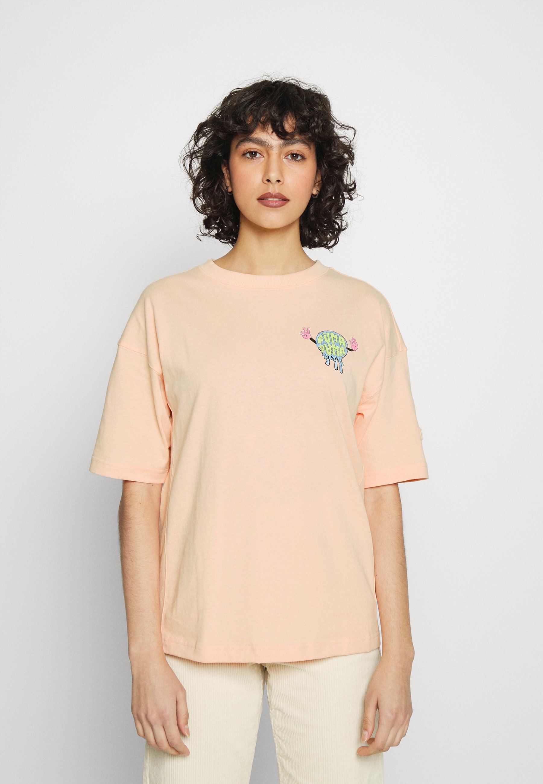 peach puma shirt