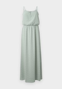 Robe maxi en tissu vert clair avec un motif de pois blancs, bretelles spaghetti, taille élastique et silhouette fluide. Texture lisse.
