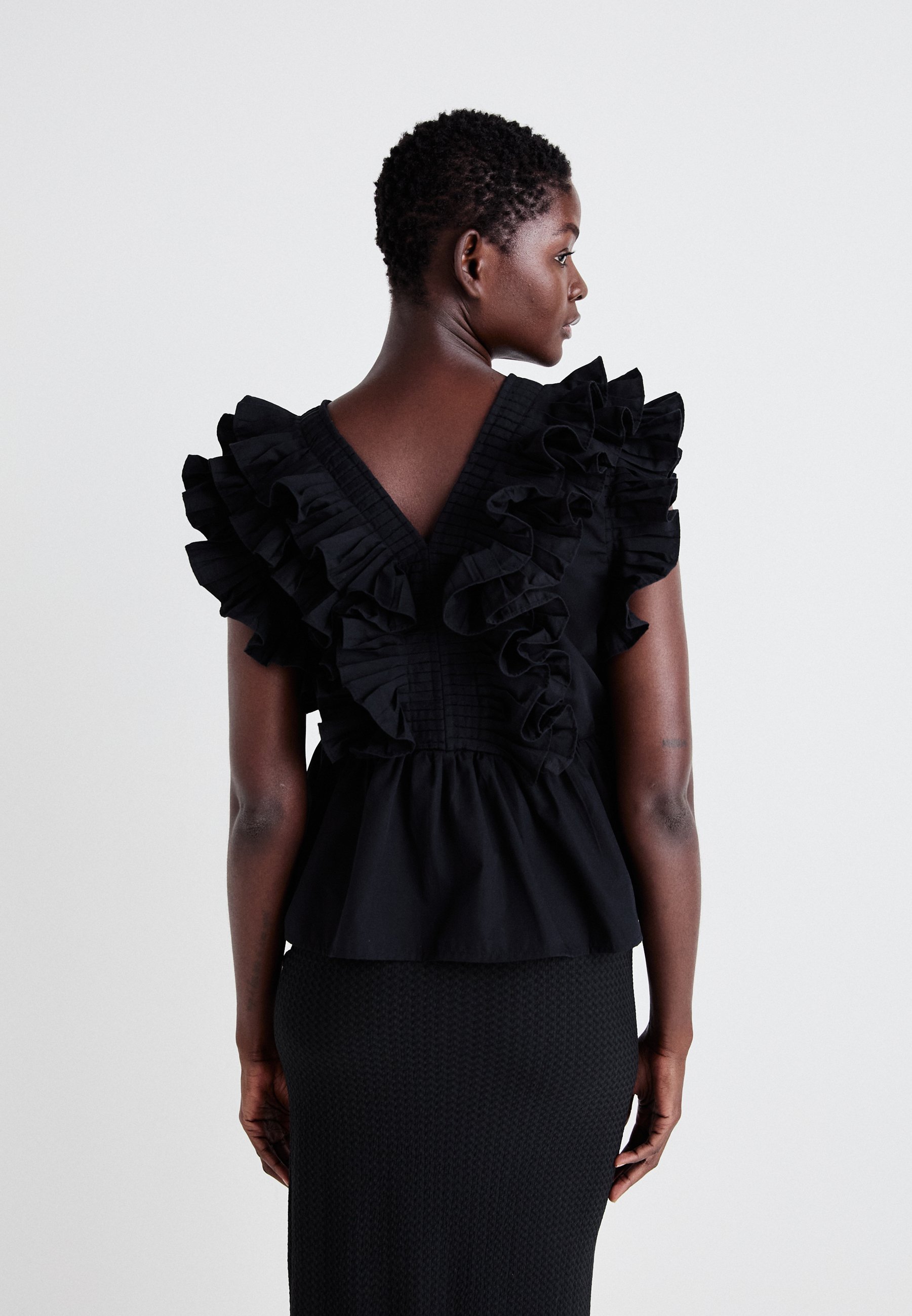 black ruffle blouse