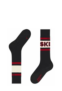Calzini neri con strisce orizzontali rosse e crema e logo "SKI". Presentano punta e tallone rinforzati, texture morbida e risvolto strutturato.