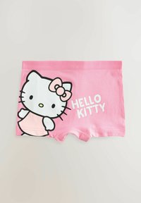 Rózsaszín pamut rövidnadrág, amely elöl egy nagy Hello Kitty grafikával és a "HELLO KITTY" felirattal van díszítve, vastag fehér betűkkel.