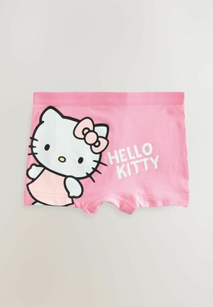 Rosa bomullsshorts med en stor Hello Kitty-grafik på framsidan och texten "HELLO KITTY" i fetstil vit bokstäver.