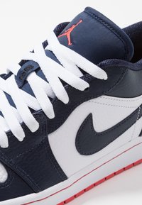 air jordan 1 low white hyper crimson light bone