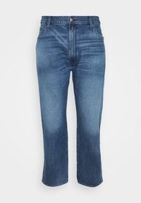 Jeans de ganga azuis com cintura alta, corte reto e comprimento cropped. Apresentam desbotamento leve e um design clássico de cinco bolsos.