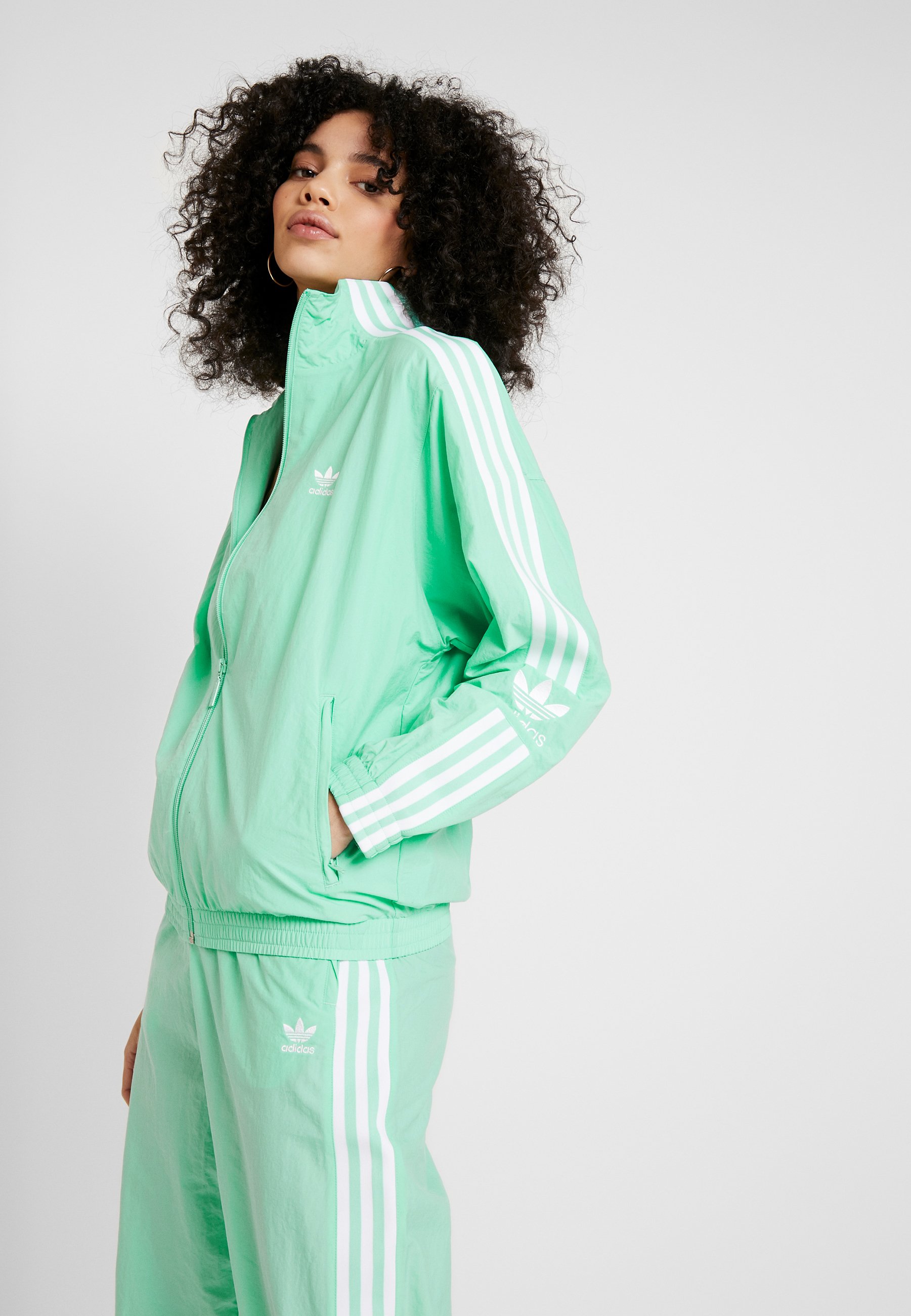 mint green adidas jacket