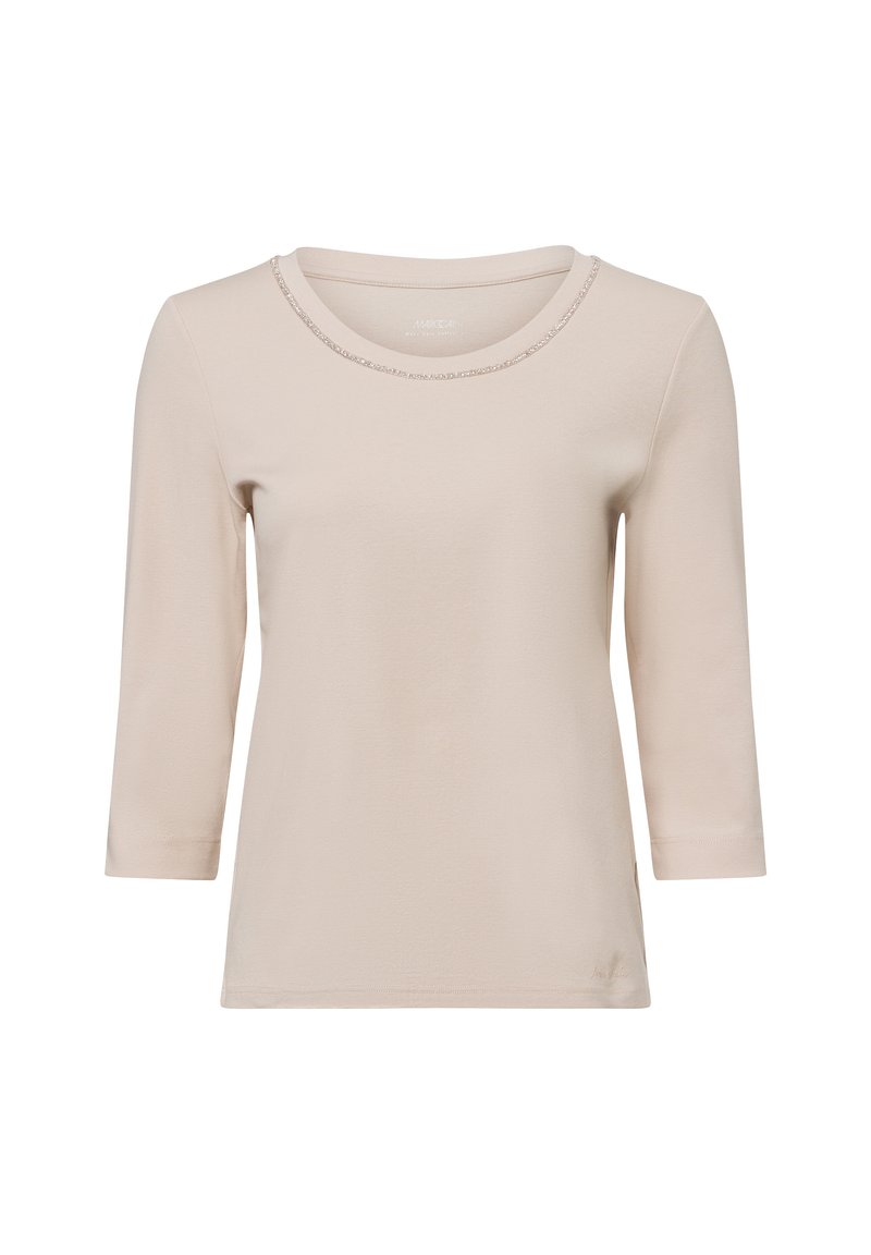 Beige langsloven shirt met een ronde halslijn, voorzien van een gestructureerde rand. Gemaakt van een zachte stof, heeft het een relaxte pasvorm en zijsplitten.