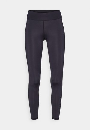 Zwarte leggings gemaakt van rekbaar, glad materiaal met een hoge taille. Heeft platte naden en een logo gedrukt langs het onderbeen.