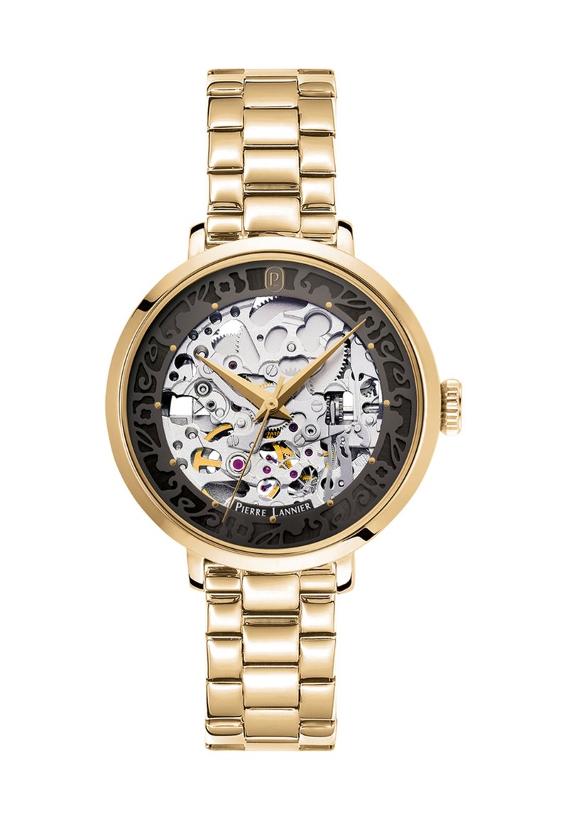 Orologio da polso dorato con design scheletrico, dotato di un quadrante trasparente che mette in mostra ingranaggi intricati e un bracciale in metallo.
