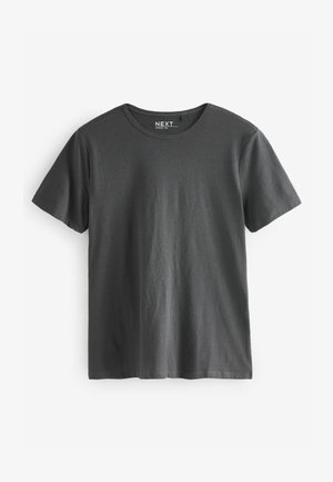 Lühikeste varrukate ja ümmarguse kaelusega särk tumedas hallis puuvillas. Silmapaistev tekstuur klassikalises lõikes, sirge ääre ja minimaalsete brändingutega.