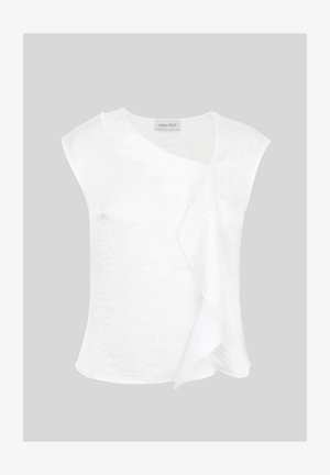 Blouse blanche sans manches avec encolure ronde et détail de volants sur un côté, présentée sur un fond clair uni.