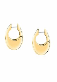 Orecchini a cerchio in tono oro con un design liscio e curvo. Presentano una chiusura a cerniera e una superficie lucida, creando un effetto riflettente.