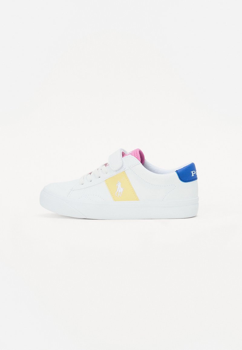 White sneaker with yellow diamond accent, pink lining, and blue heel. Features a velcro strap and laces, made from smooth synthetic material.