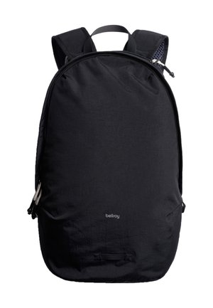 Black Bellroy backpack with padded shoulder straps, top handle, and visible zipper closures on a white background.