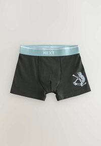 Boxer neri in cotone con un elastico azzurro chiaro in vita, con una grafica di uno scheletro che fa snowboard stampata in bianco.