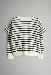 Sudadera de rayas en crema y azul marino, con mangas con volantes y puños acanalados. Tela suave con un ajuste relajado y cuello redondo.