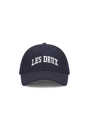 Navy blue cap made of fabric, features white embroidered text "LES DEUX" on the front, structured crown, and curved brim.