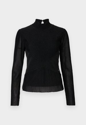 Μαύρο εφαρμοστό τοπ με μακριά μανίκια, ψηλό λαιμό και κλείσιμο στο πίσω μέρος με κουμπί. Υφασμάτινο σχέδιο με ραβδώσεις και διαγώνιες ραφές στην επιφάνεια.