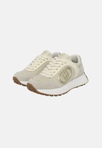 Sneaker beige con tomaia testurizzata, caratterizzata da dettagli in glitter e un logo lucido. Design con lacci, suola ammortizzata e suola in gomma.