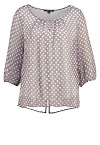 Blusa a pois viola chiaro in tessuto trasparente, con scollatura rotonda, dettagli arricciati e maniche a tre quarti con orlo spaccato.