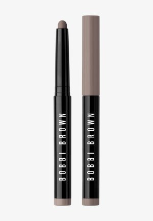 Bobbi Brown dual-ended make-up potlood met zwarte verpakking, voorzien van een crème-kleurige punt en een matte bruine verpakking met witte tekst.