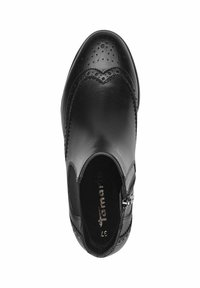 Svart läderankelboot med rundad tå, dekorativ broguedetaljering, sidodragkedja och slät yta med mjukt innertyg.