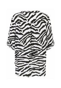 Schwarzes und weißes Zebra-Print-Oberteil mit kurzen Ärmeln, lässiger Passform, Rundhalsausschnitt, strukturiertem Stoff und Mittelnaht am Rücken.