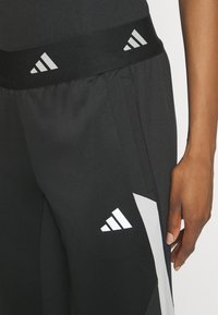 adidas Performance Pantalones deportivos - black