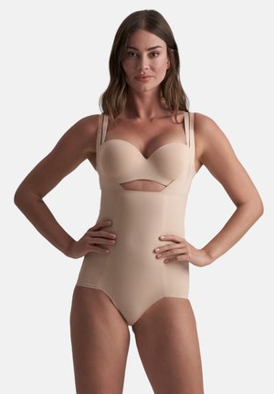 Body color beige con design a taglio sul petto, coppe modellate e spalline sottili. Realizzato in materiale morbido e elastico.