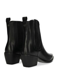 Svarta läderstövlar som har en slimmad design, med elastiska sidopaneler, en dragflik på baksidan och en låg blockklack.