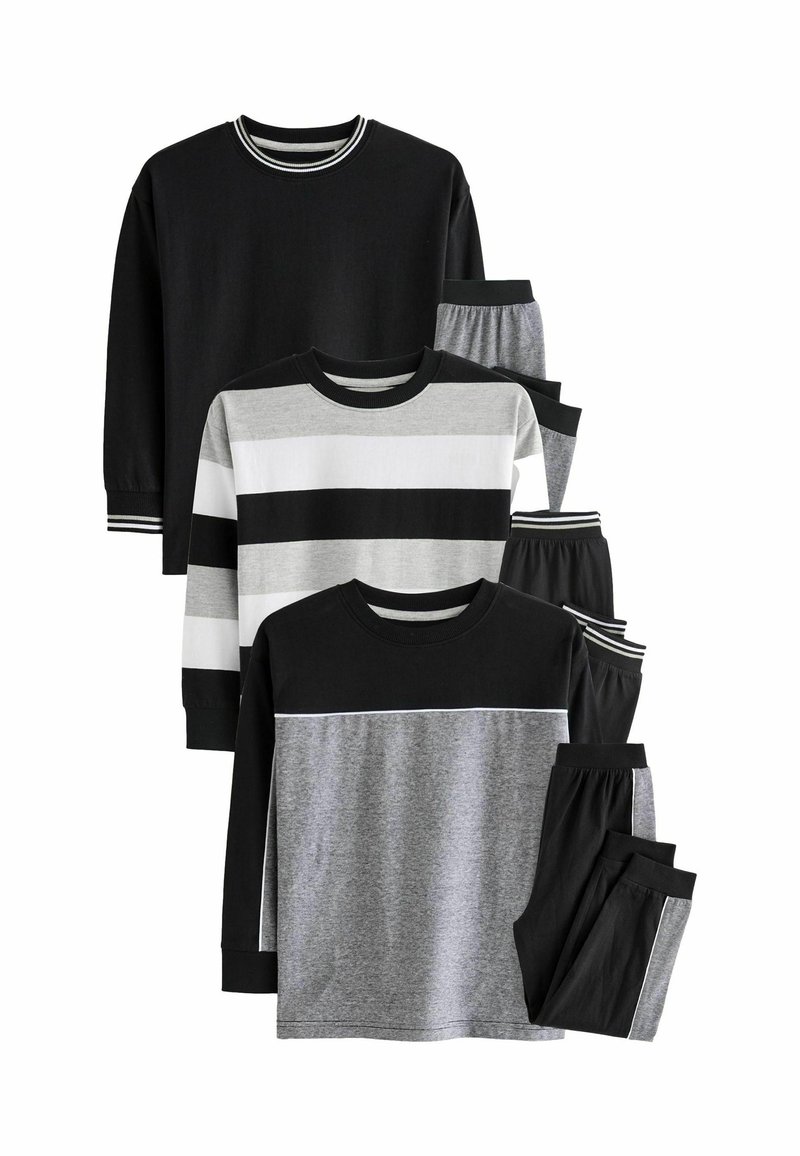 Deux ensembles de vêtements de détente pour enfants comprenant des tissus noir, gris et blanc. Comprend des t-shirts à manches longues avec divers motifs de rayures et des pantalons.