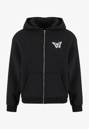 Fekete cipzáros kapucnis pulóver pamut keverékből készült. Elülső zsebe van, és fehér pillangó grafika található a bal mellkasán. Ribbeléses mandzsetták és szegély.