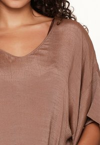 LingaDore Strandaccessoire - nutshell