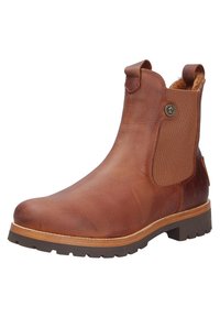 Botín de cuero marrón hasta el tobillo con paneles laterales elásticos, costuras reforzadas y una suela de goma texturizada. Interior acolchado para mayor comodidad.