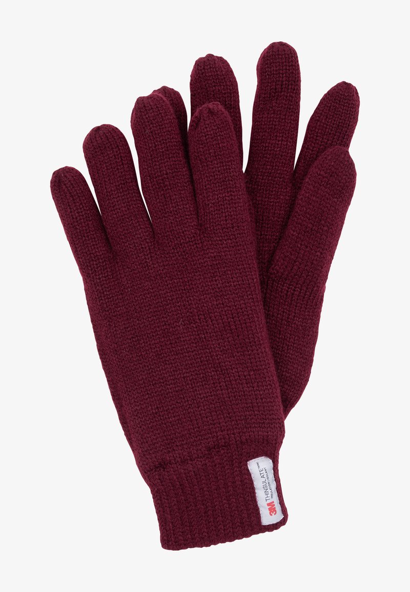 Burgundy knitted gloves with a ribbed cuff and tag. Textured material with five finger design, offering warmth and coverage for hands.