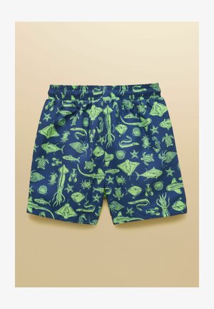 Marineblauwe shorts met een elastische tailleband en een felgroen zeedierenpatroon met onder andere vissen, schildpadden, inktvissen, zeesterren en krabben.