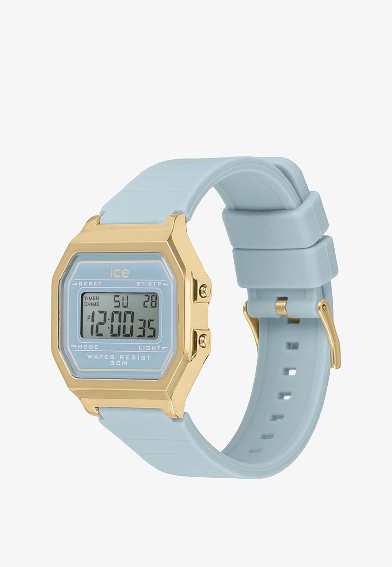 Cyfrowy zegarek na rękę z jasnoniebieskim silikonowym paskiem, prostokątną kopertą w kolorze złotym oraz przezroczystym wyświetlaczem LCD, na którym pokazany jest czas oraz ustawienia.