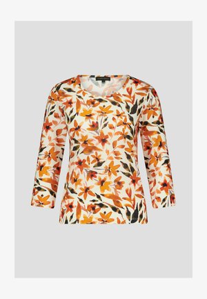 Bloemenprint top met 3/4 mouwen en ronde halslijn, in tinten van oranje, zwart en crème, gemaakt van een lichtgewicht stof.
