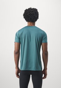 New Balance ESSENTIALS - T-skjorte til trening - new spruce