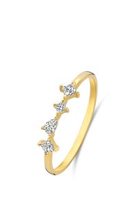 Bague en or ornée de quatre pierres précieuses transparentes de différentes formes : une poire, une ronde et deux taille princesse, avec une finition polie.