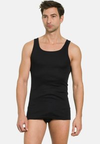 Black tank top made of cotton, featuring a scoop neckline and wide shoulder straps. Slim-fit design, smooth texture.