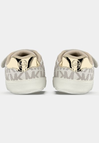 White sneakers with a textured upper featuring a repeating logo pattern. Gold-tone accents on the heel and a cushioned collar. Rubber sole.