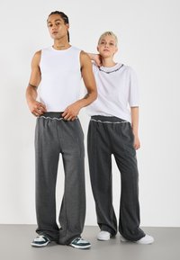 YOURTURN UNISEX - Donji dijelovi trenirke - mottled dark grey