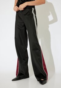 Koton X İNJI - WIDE LEG - Trainingsbroek - black