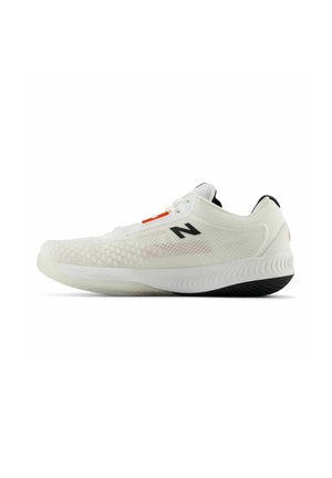White athletic shoe with a mesh upper, grey accents, black heel, orange logo, and textured sole for traction. Features a lace-up design.