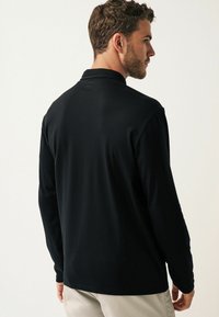Next Polosärk - black