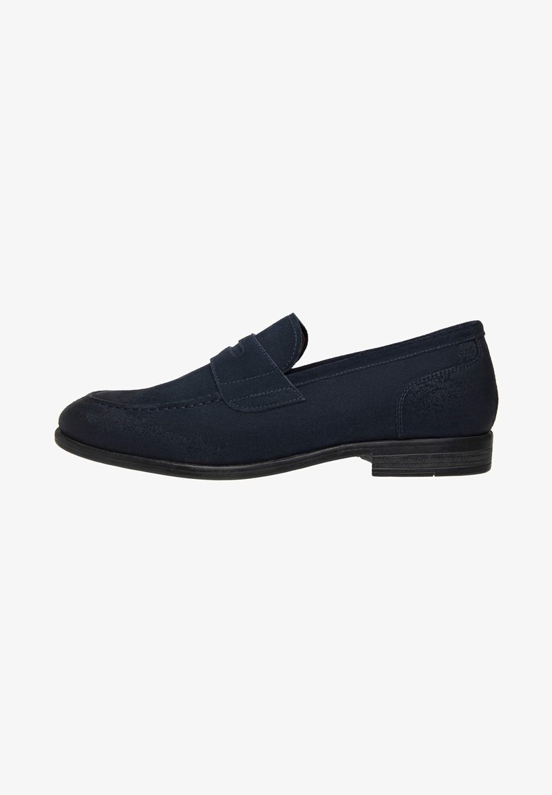 Navy blue suede loafers with a stitched seam, rounded toe, and flat black rubber sole. Features a front decorative flap.